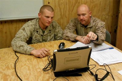 Marines review the laptop