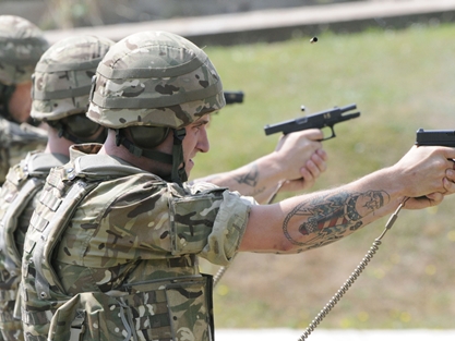 Sailors undergoing training on new pistols 